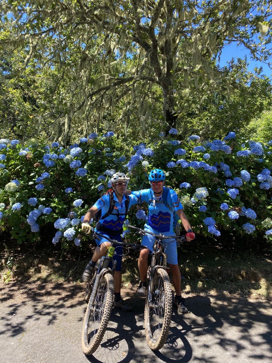 Guides in front of flowers