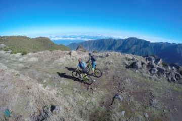 2 Bikers on the mountain top